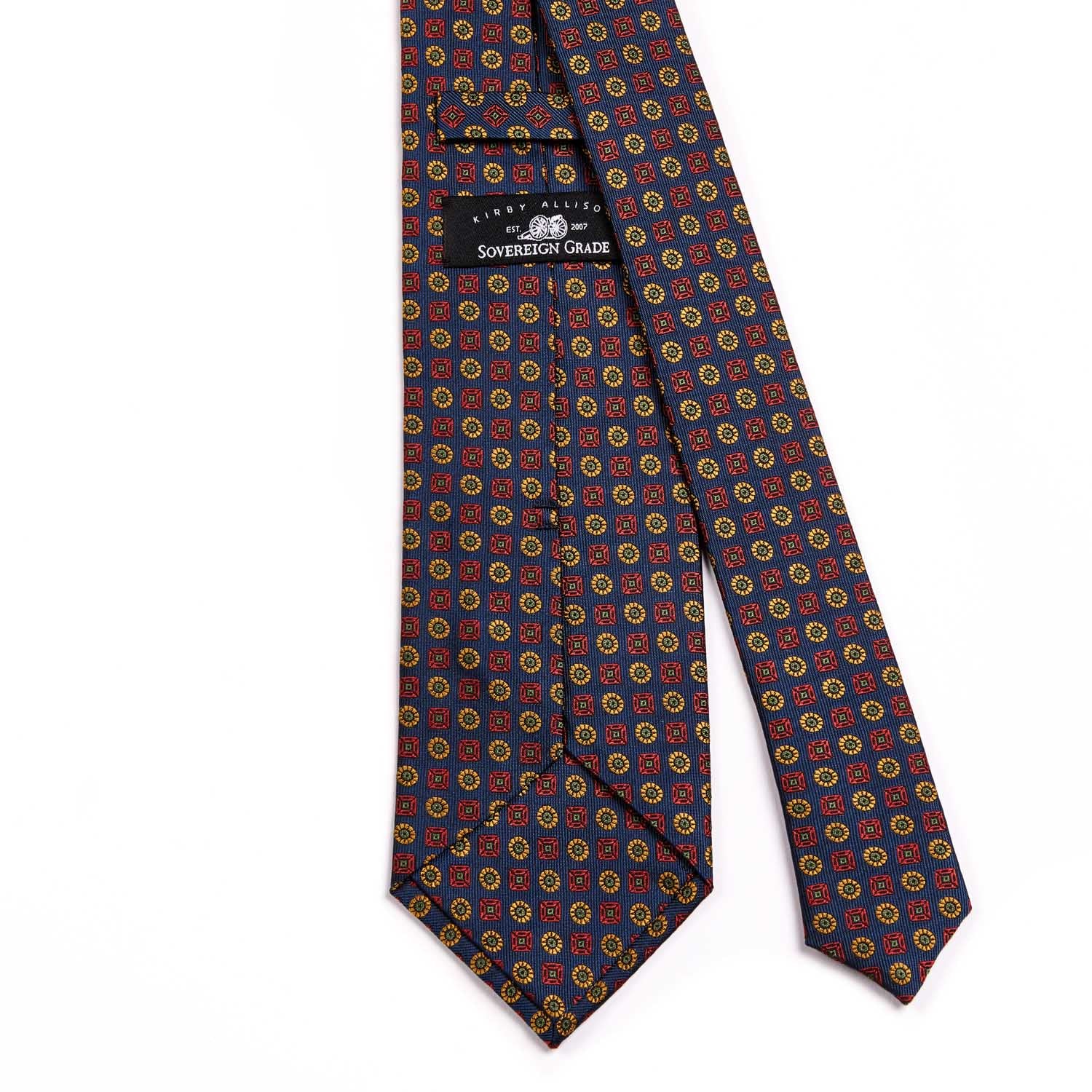 A KirbyAllison.com Sovereign Grade Navy Floral Jacquard Tie, 150 cm with a colorful pattern made in the United Kingdom.