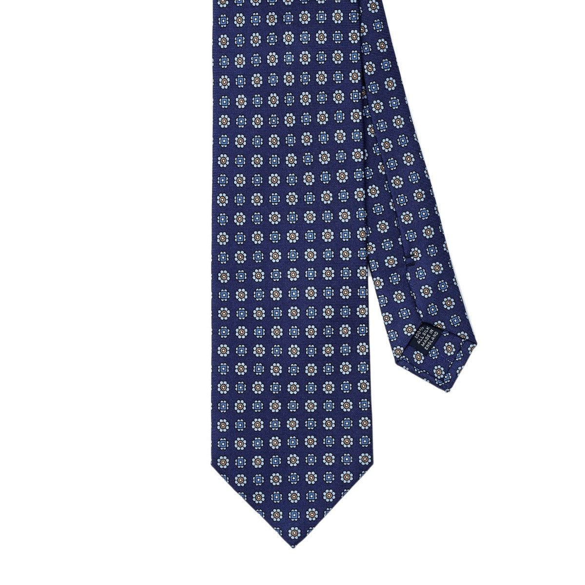 A Sovereign Grade Navy Floral 36oz Printed Silk Tie, made by KirbyAllison.com, with a pattern on it, made from 100% English silk.