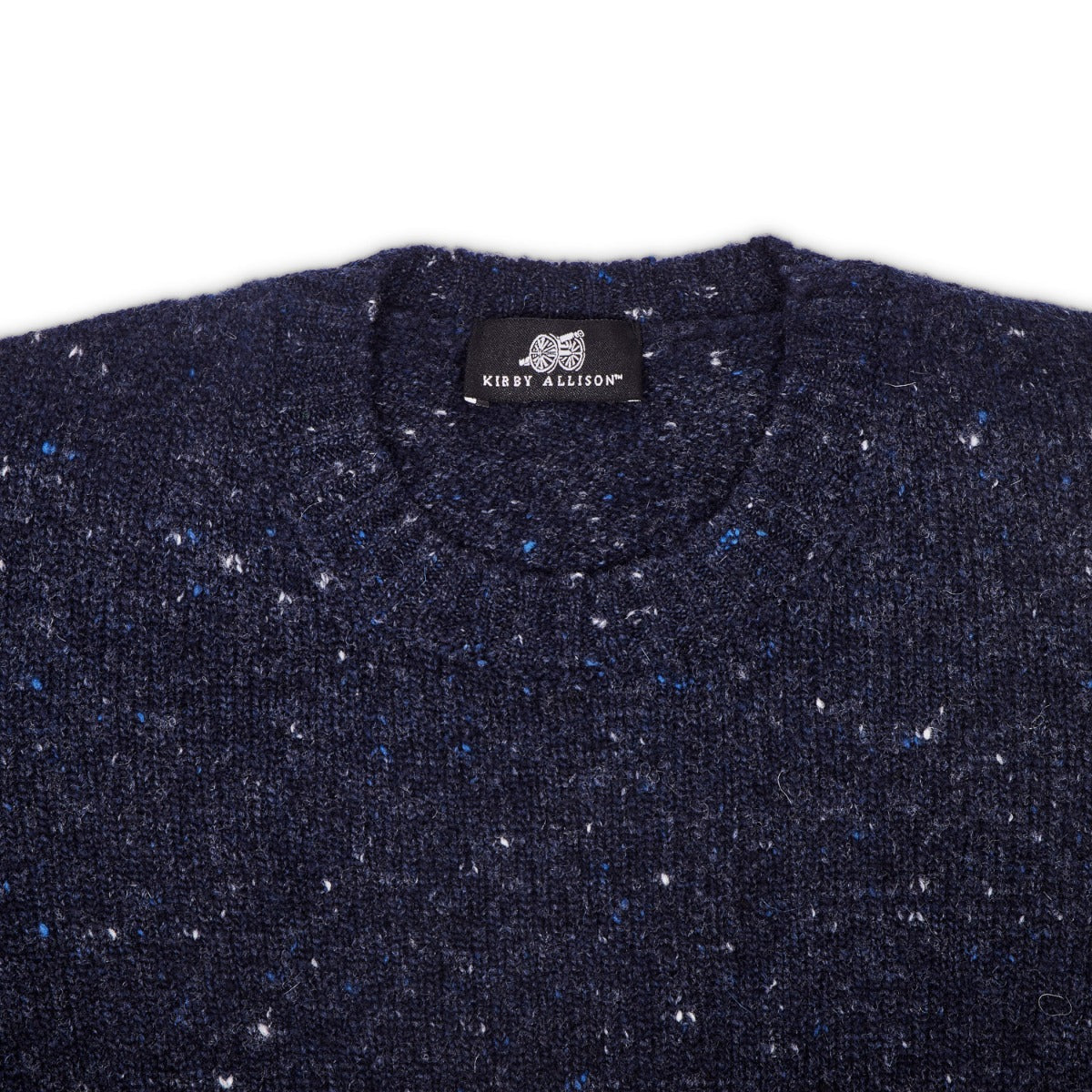 A Sovereign Grade Blue Donegal Crew Neck Sweater with blue and white speckles from KirbyAllison.com.