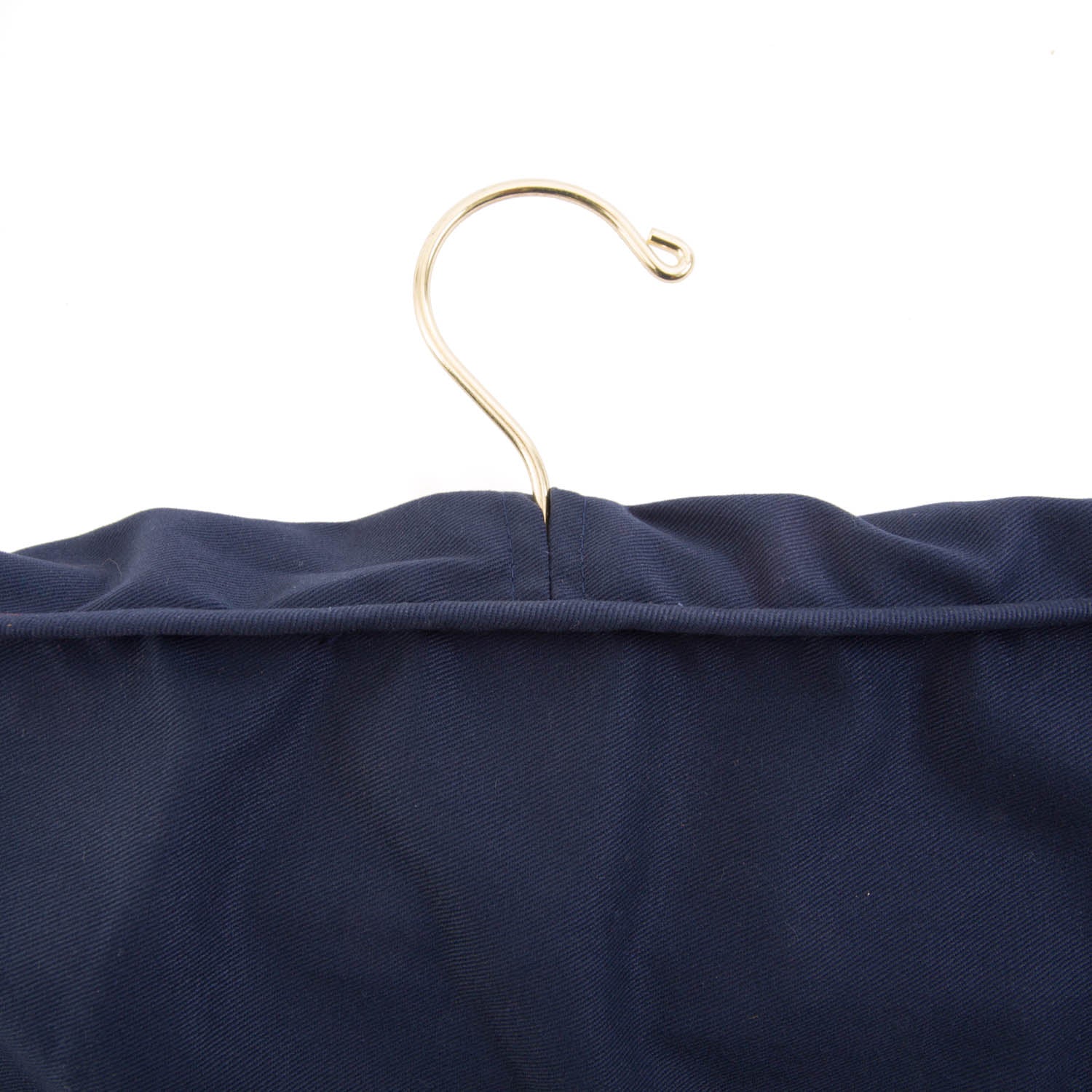 A blue KirbyAllison.com garment hanger for a closet featuring the Deluxe Cotton Twill Trouser Dust Cover.