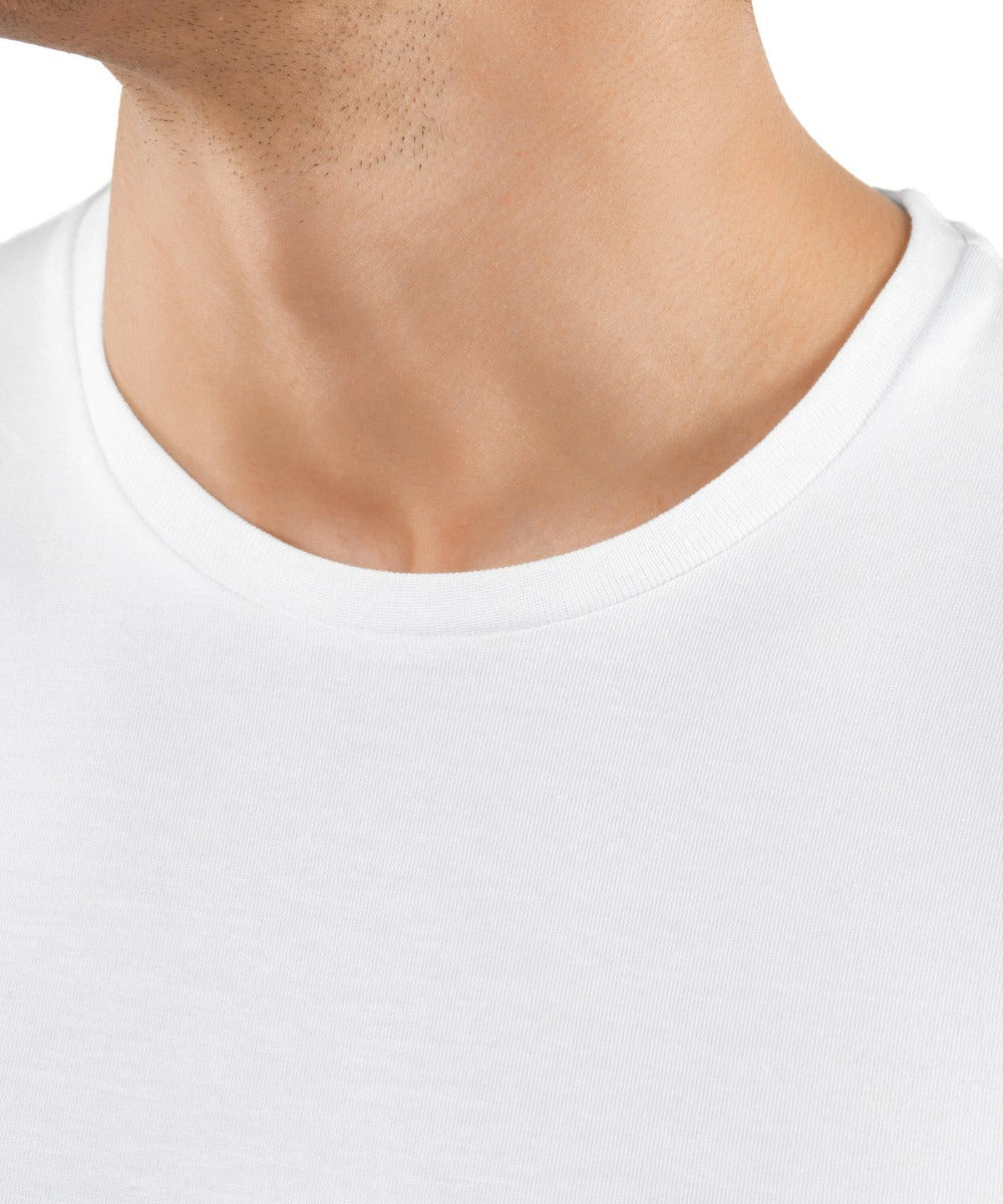 A close up of a man wearing a white KirbyAllison.com Falke Men Underwear Crew Neck T-Shirt 2-Pack.