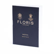 A black card with the word FLORIS on it, offering promo codes for FLORIS Santal Sample Vials available at KirbyAllison.com.