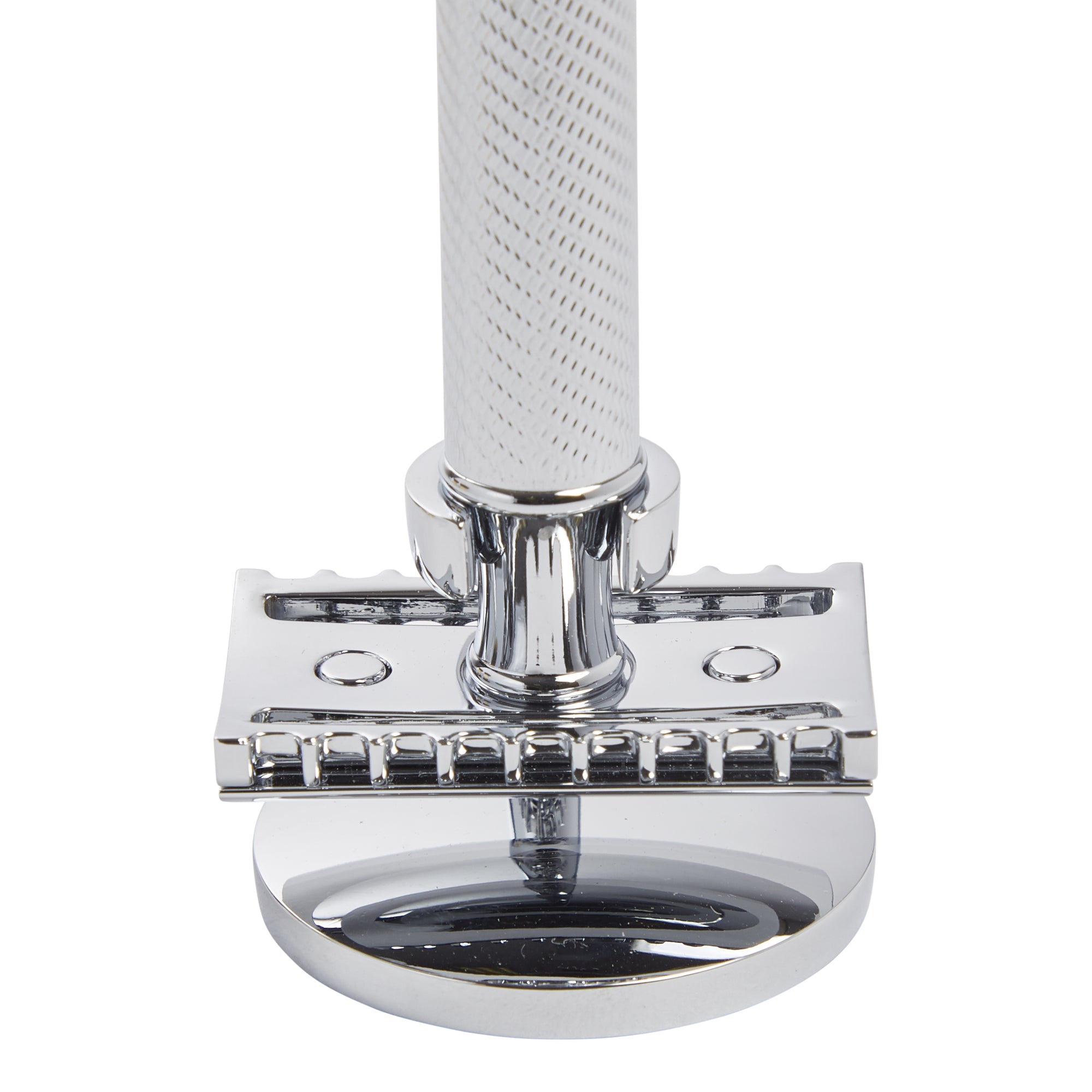 An elegant KirbyAllison.com Muhle Safety Razor Stand with a white handle for a man's bathroom.
