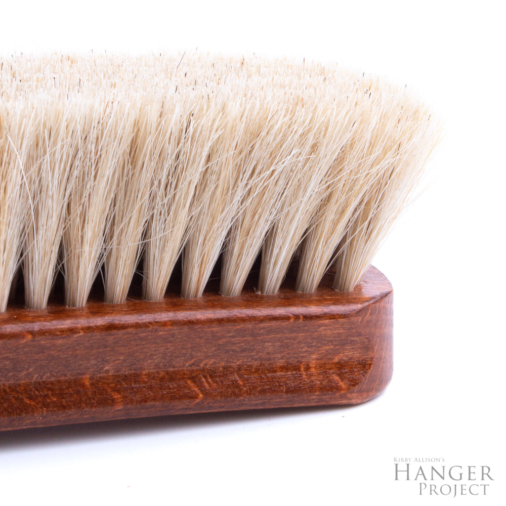 An Extra-Large Wellington Horsehair Shoe Polishing Brush with a wooden handle on a white background from KirbyAllison.com.