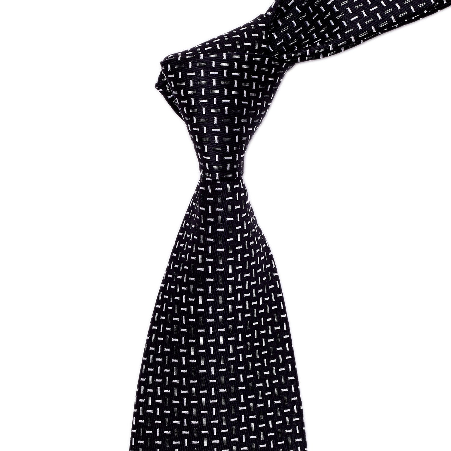 A Sovereign Grade Cross-Bar Jacquard Tie by KirbyAllison.com, handmade, black and white, on a white background.
