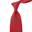 A Sovereign Grade Red Floral 25oz Silk Hopsack Tie (150x8.5 cm) from KirbyAllison.com with white polka dots.