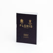 A book featuring FLORIS Jermyn Street Sample Vials and the world's best scents, titled "Floriss" by KirbyAllison.com.