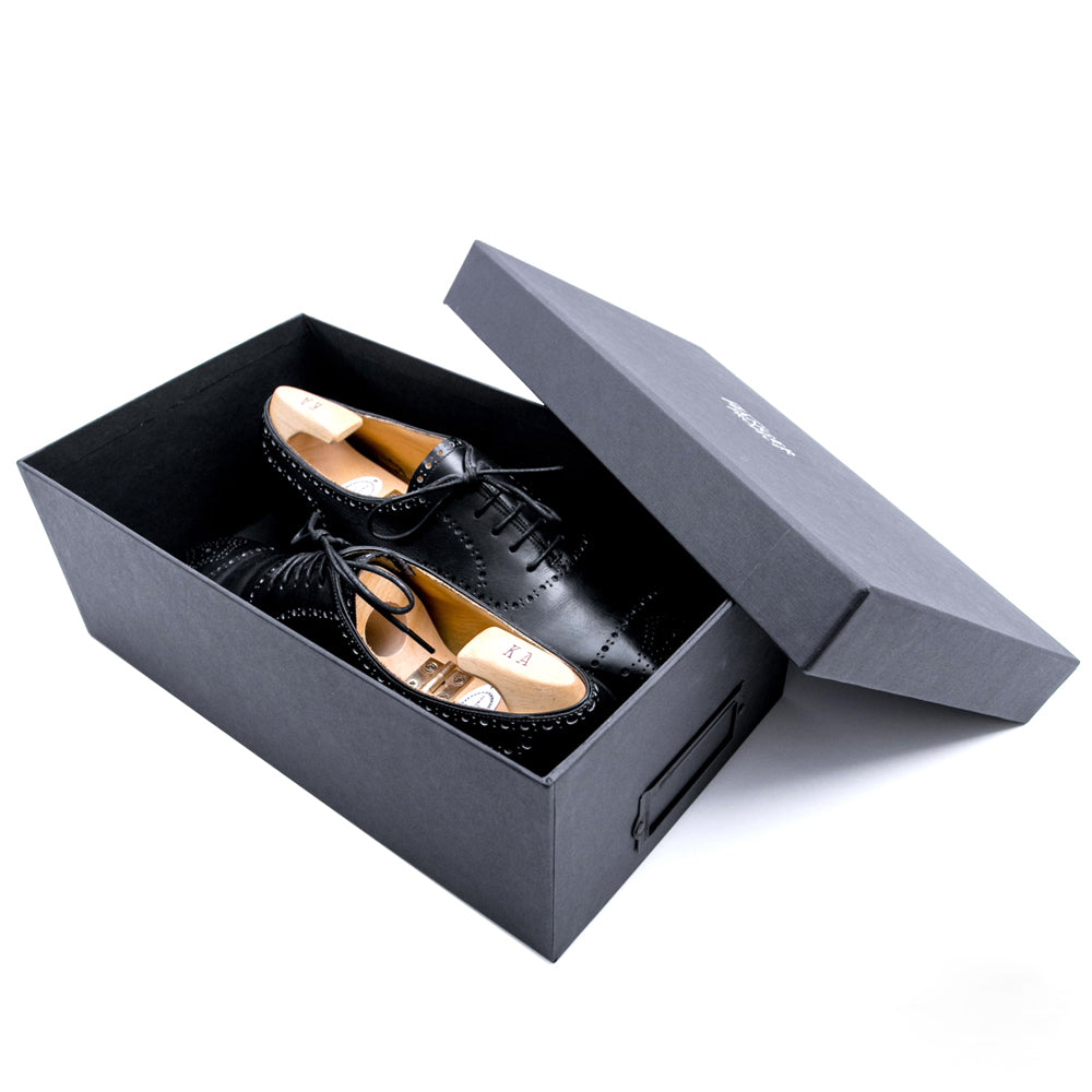 A pair of Deluxe Wellington Shoe Storage Box by KirbyAllison.com on a white background.