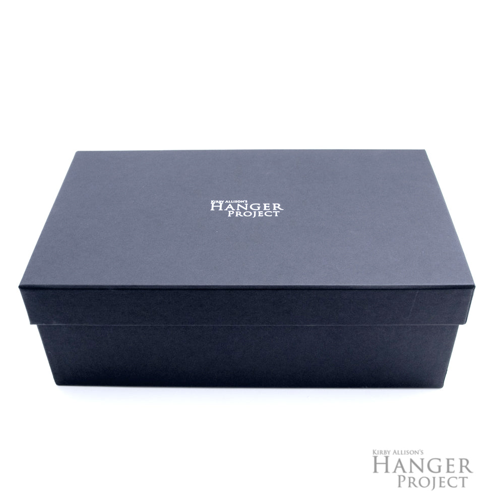 A black Deluxe Wellington Shoe Storage Box from KirbyAllison.com with the words hanger project on it.