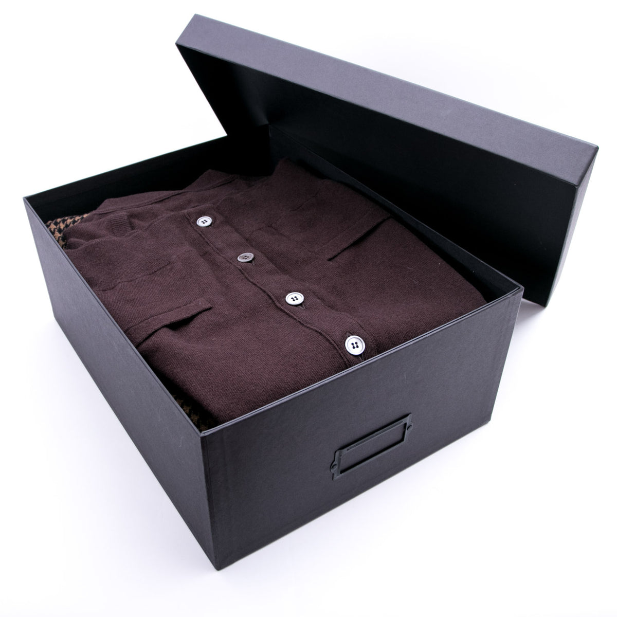A brown Hanger Project Garment Storage Box from KirbyAllison.com with a brown shirt inside.