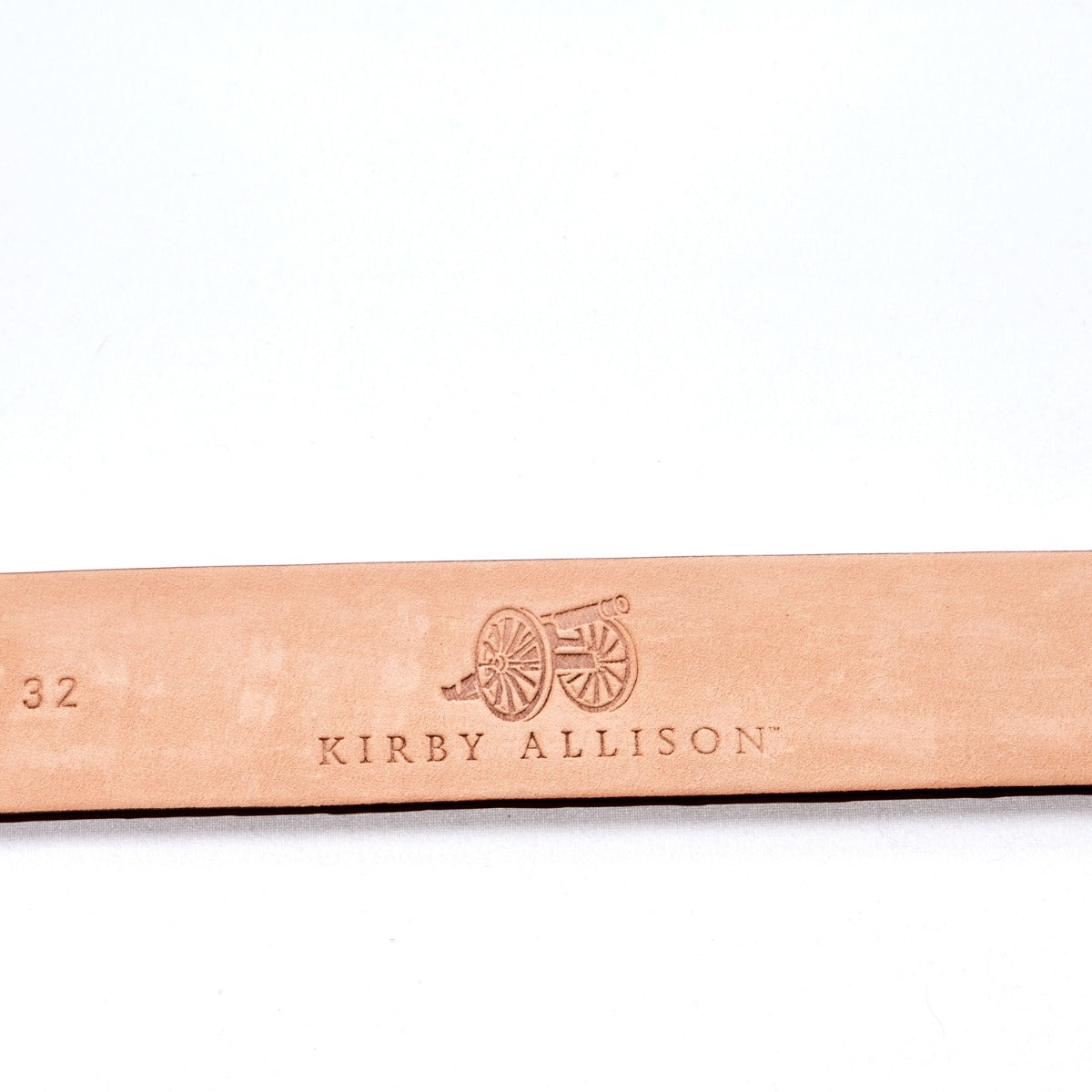 A Sovereign Grade Cognac Crocodile Belt from KirbyAllison.com with the word kerry allison on it.