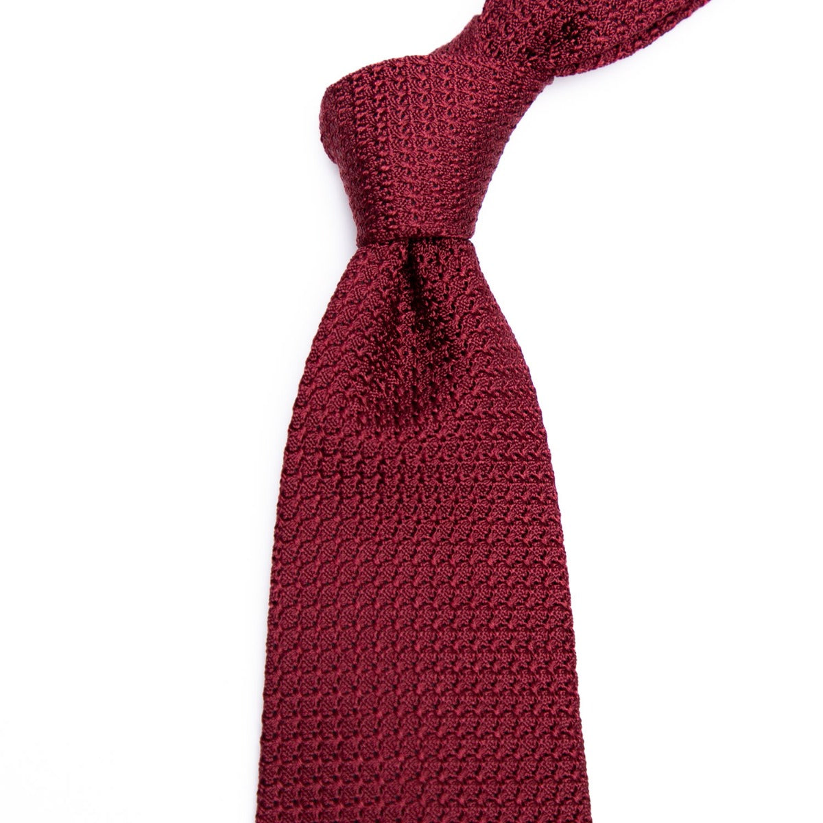 Handmade Sovereign Grade Grenadine Grossa Ruby Tie by KirbyAllison.com on a white background of exceptional quality.