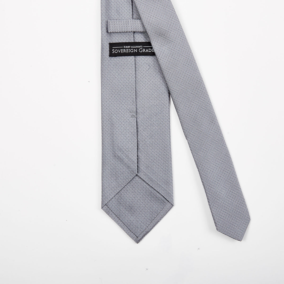 A Sovereign Grade Silver Silk Micro Dot Tie by KirbyAllison.com on a white background.