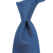 A Sovereign Grade Blue Silk Micro Dot Tie on a white background from KirbyAllison.com in United Kingdom.