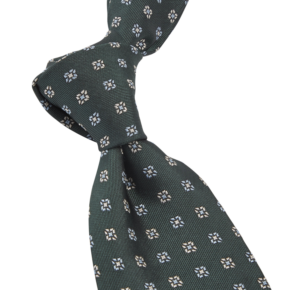 A Sovereign Grade Forest Green Square Floral Jacquard Tie with white flowers on a green silk background from KirbyAllison.com.