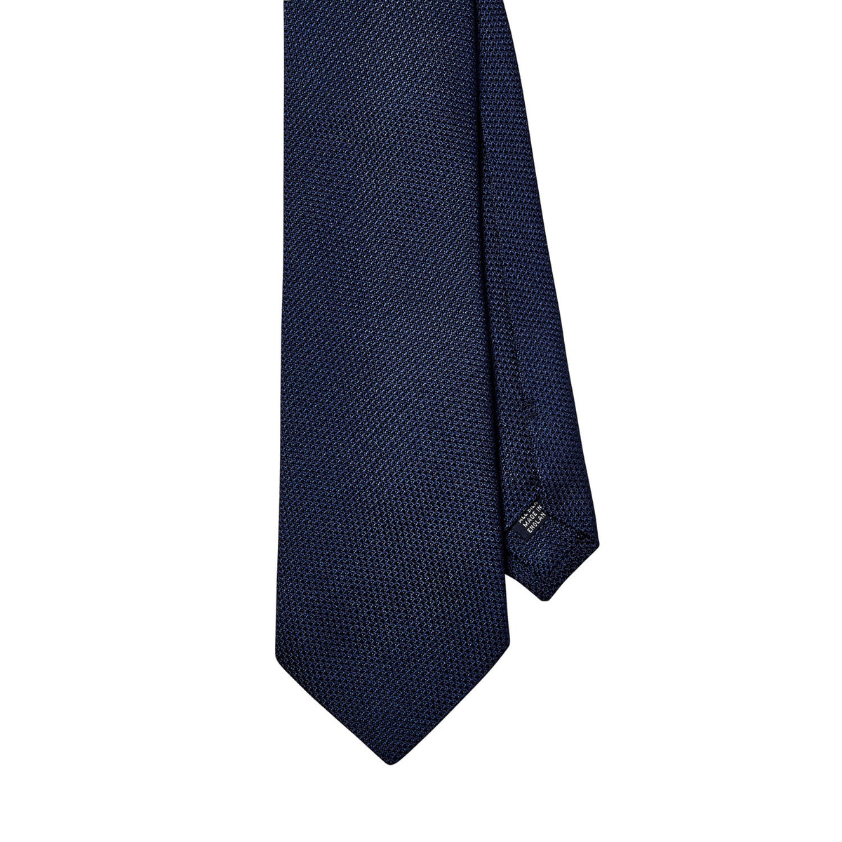 Handmade KirbyAllison.com Sovereign Grade Grenadine Fina Navy ties in various shades of blue on a white background, meticulously crafted in the United Kingdom.