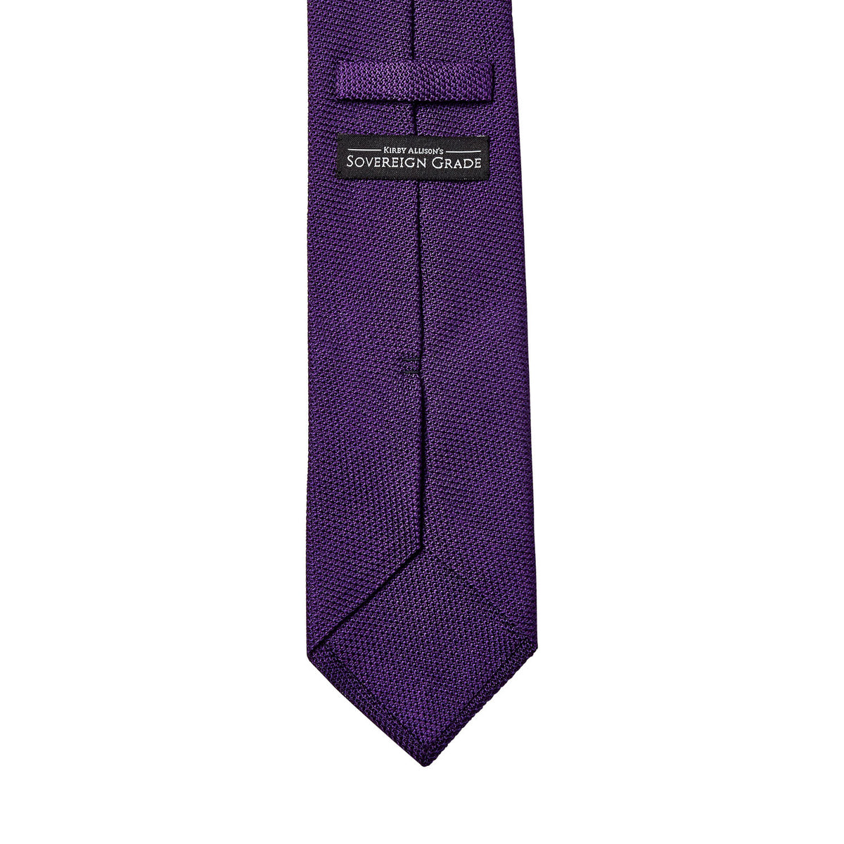 A Sovereign Grade Grenadine Fina Purple Tie of highest quality on a white background, handmade in the United Kingdom by KirbyAllison.com.