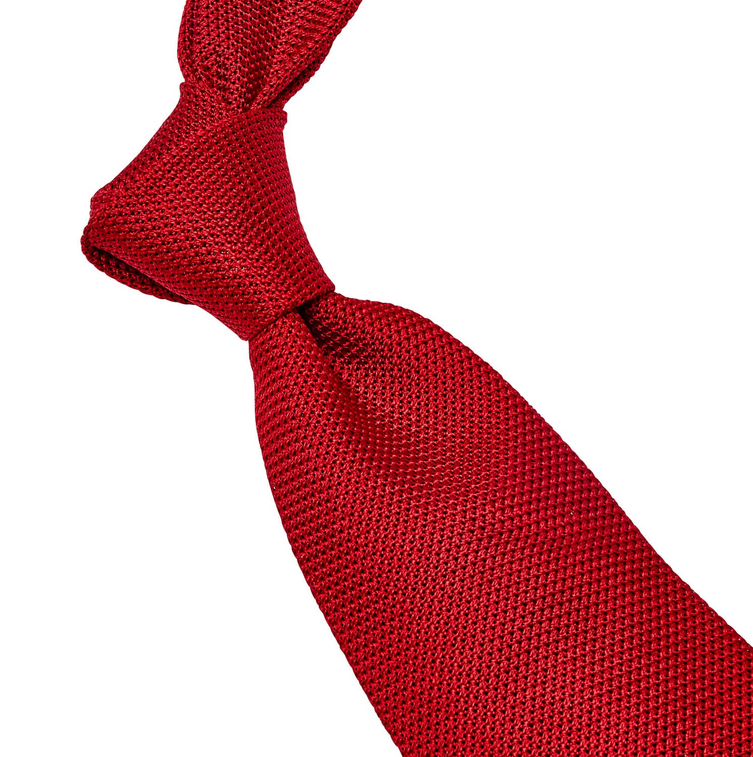 A handmade Sovereign Grade Grenadine Fina Red Tie from KirbyAllison.com on a white background, representing quality from the United Kingdom.