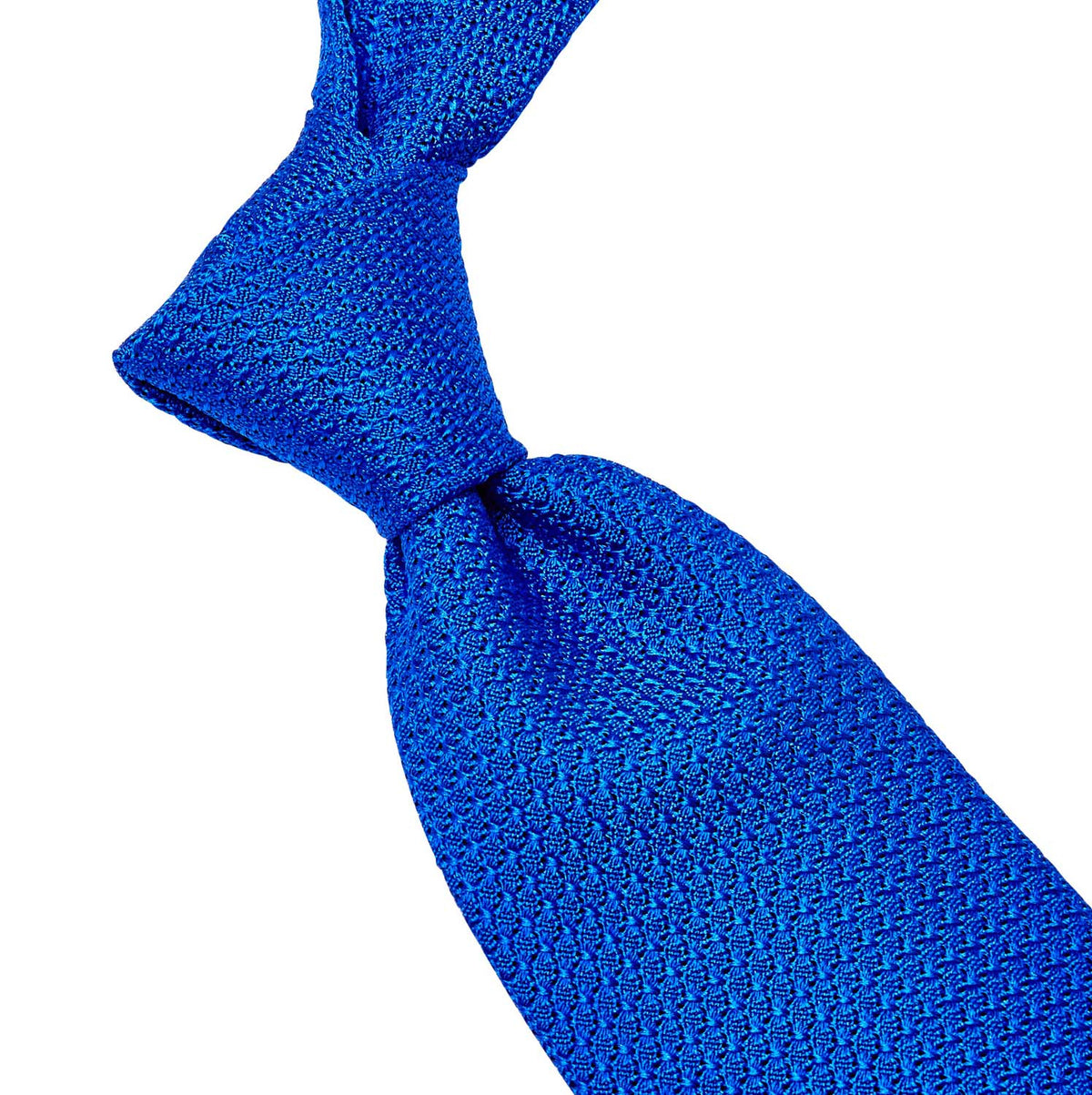 A Sovereign Grade Bright Blue Grenadine Grossa Tie by KirbyAllison.com, handmade in the United Kingdom from silk of longevity and quality on a white background.