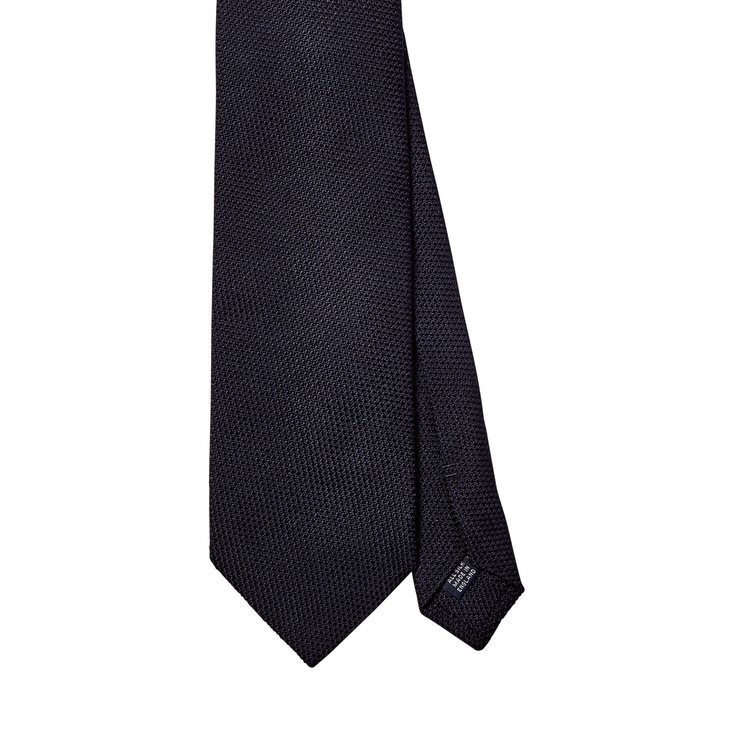 A high-quality, handmade Sovereign Grade Grenadine Fina Midnight Tie from KirbyAllison.com on a white background from the United Kingdom.