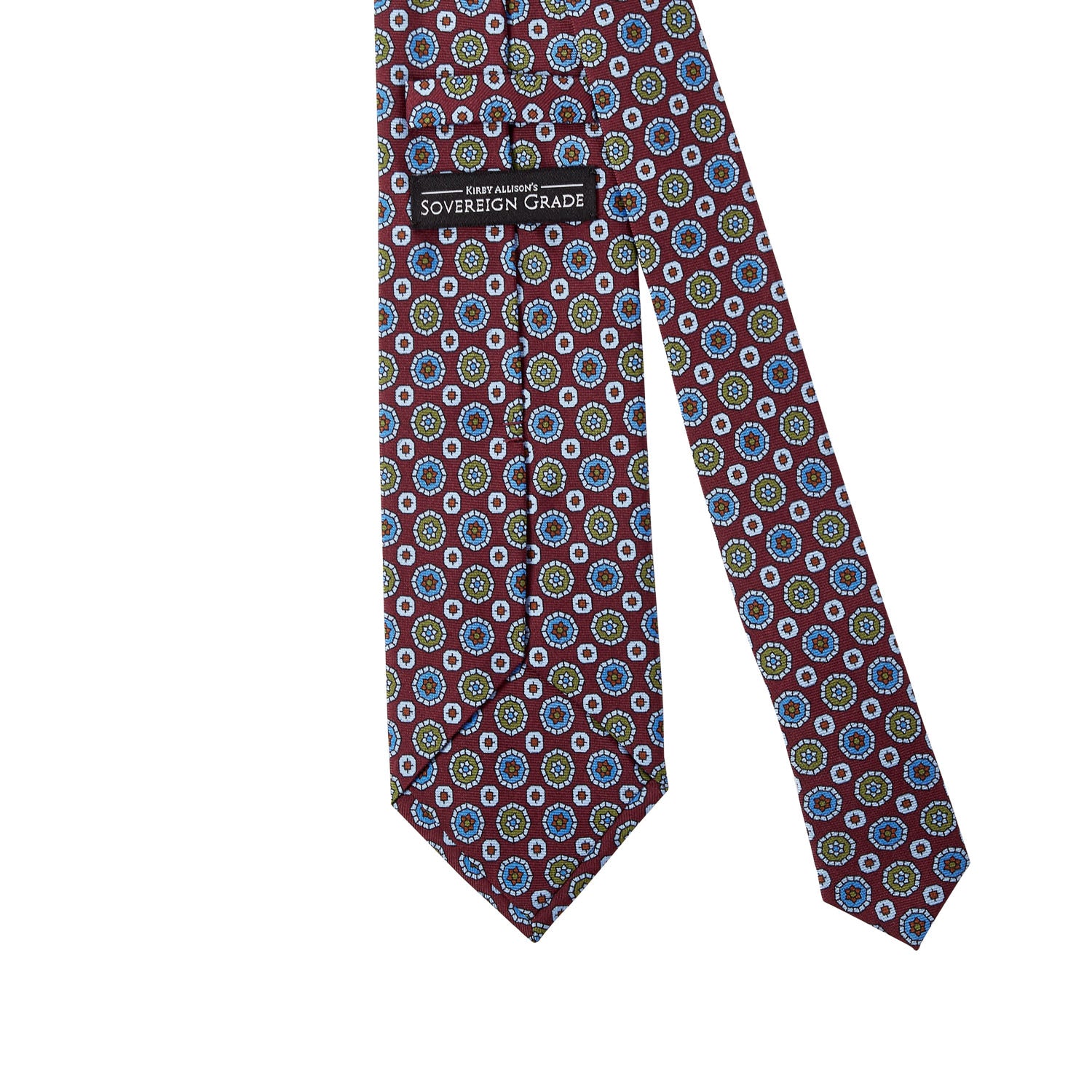 A Sovereign Grade Burgundy 36oz Printed Silk Maccesfield Tie by KirbyAllison.com with a red, blue and green pattern.