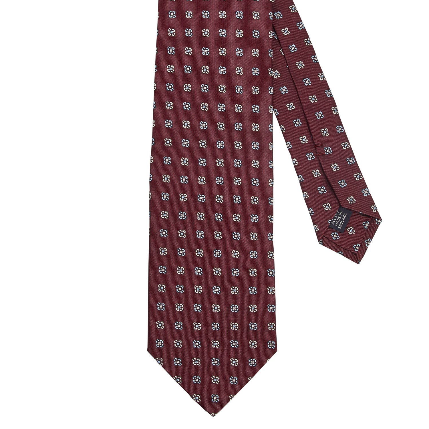A Sovereign Grade Oxblood Square Floral Jacquard Tie from KirbyAllison.com, showcasing quality craftsmanship.