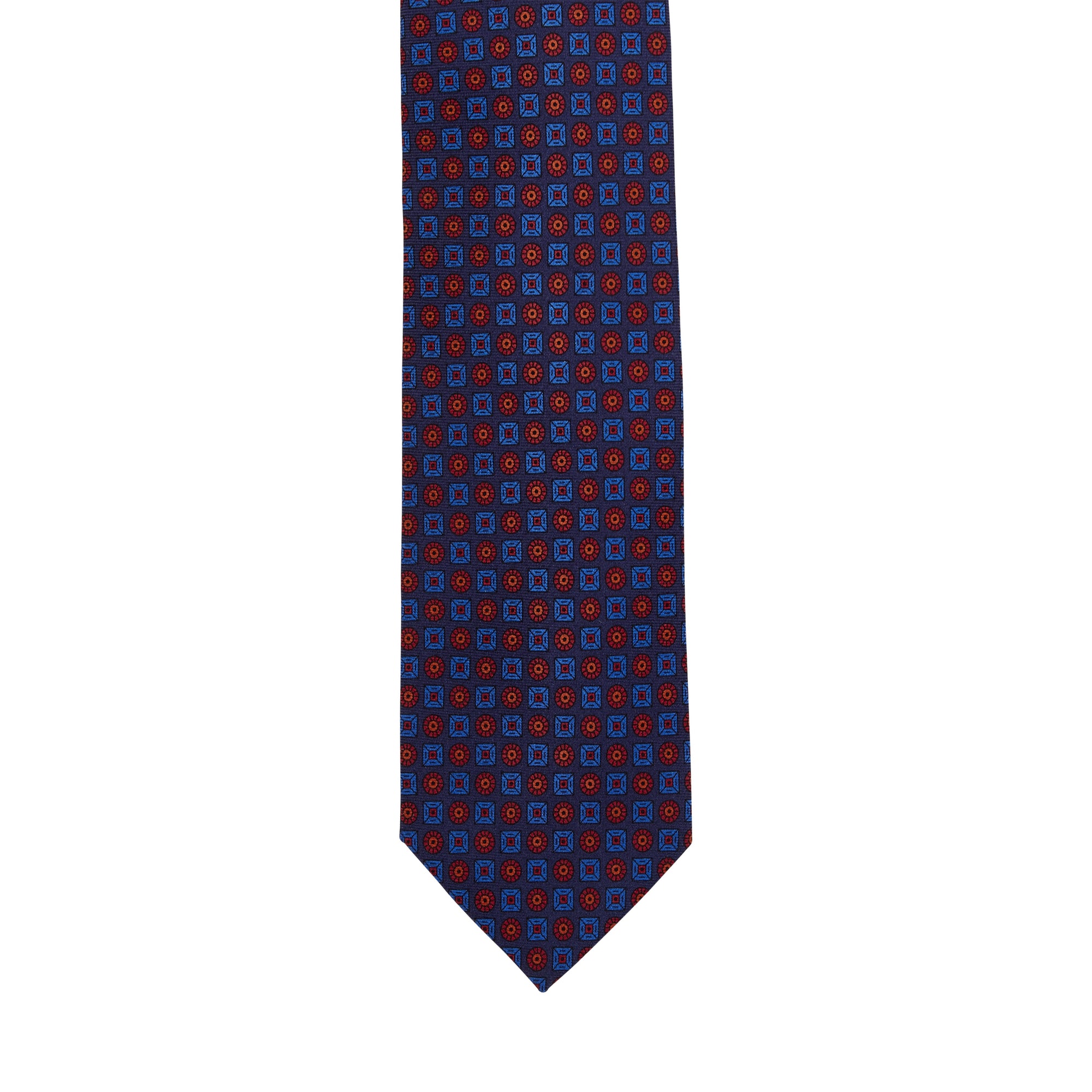 A handmade KirbyAllison.com Sovereign Grade Navy Ancient Madder tie with a blue and red polka dot pattern, crafted from 100% English silk in the United Kingdom.