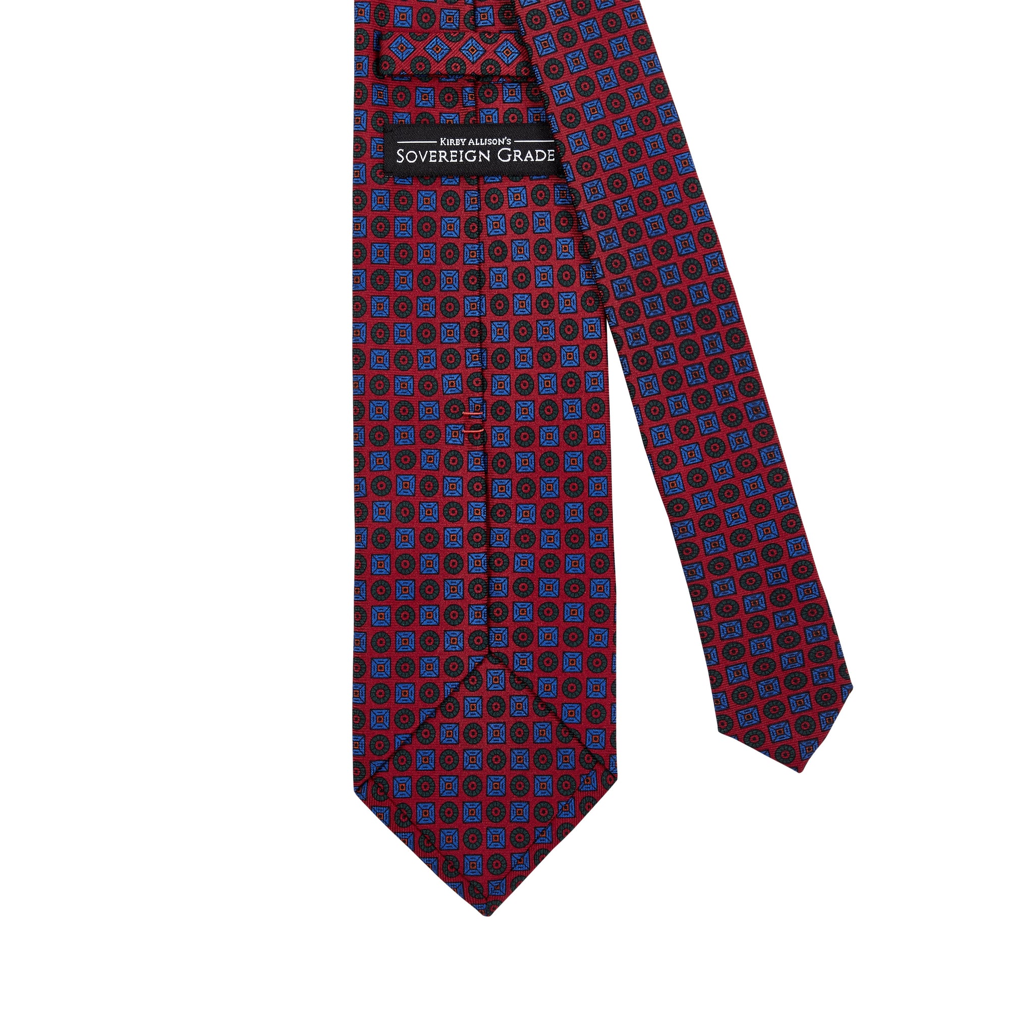 A Sovereign Grade Rust Ancient Madder Tie from KirbyAllison.com with a geometric pattern.