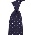 A Sovereign Grade Navy White London Dot Printed Silk Tie from KirbyAllison.com of high quality handmade in the United Kingdom.