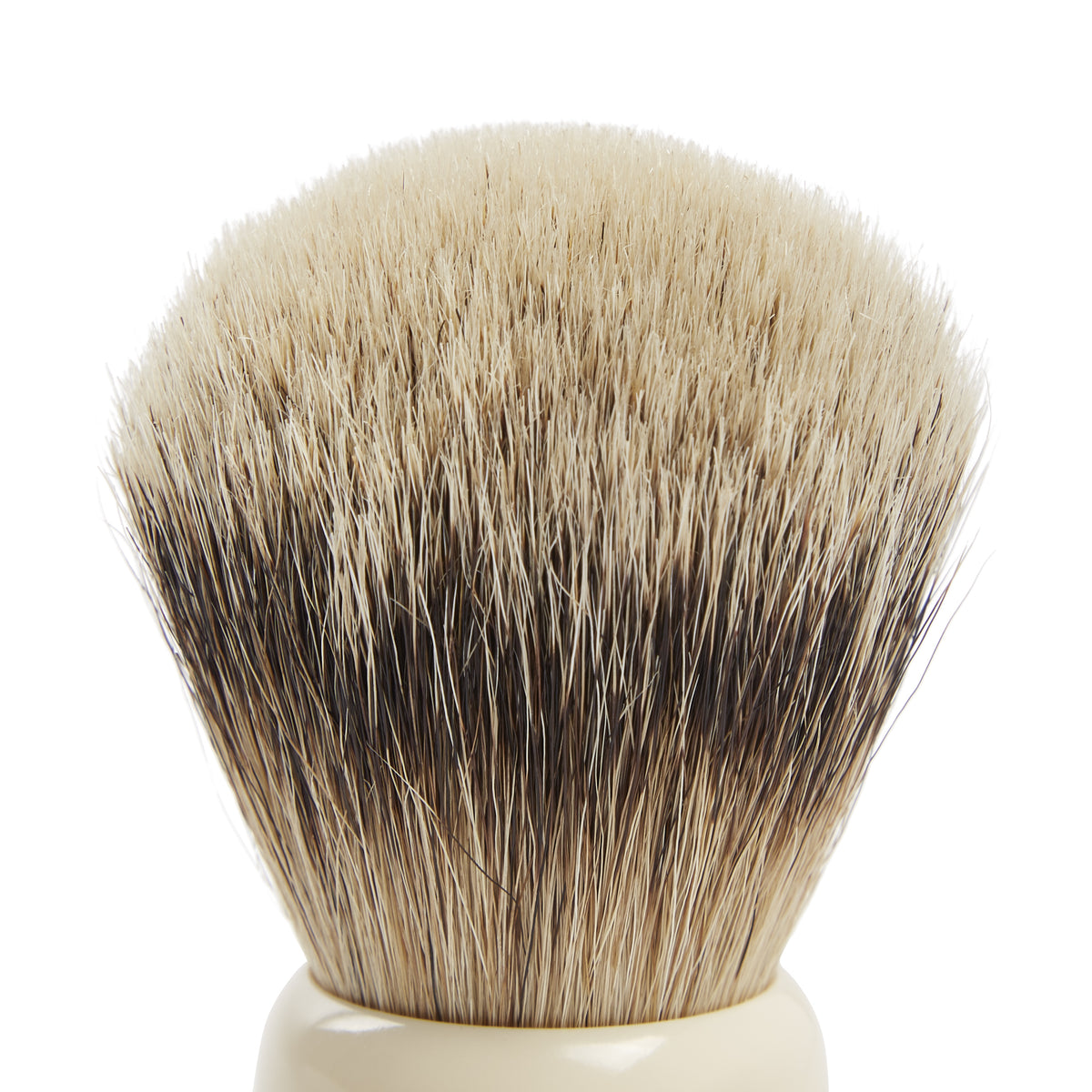 A Sovereign Grade Silvertip Badger Brush from KirbyAllison.com on a white background.