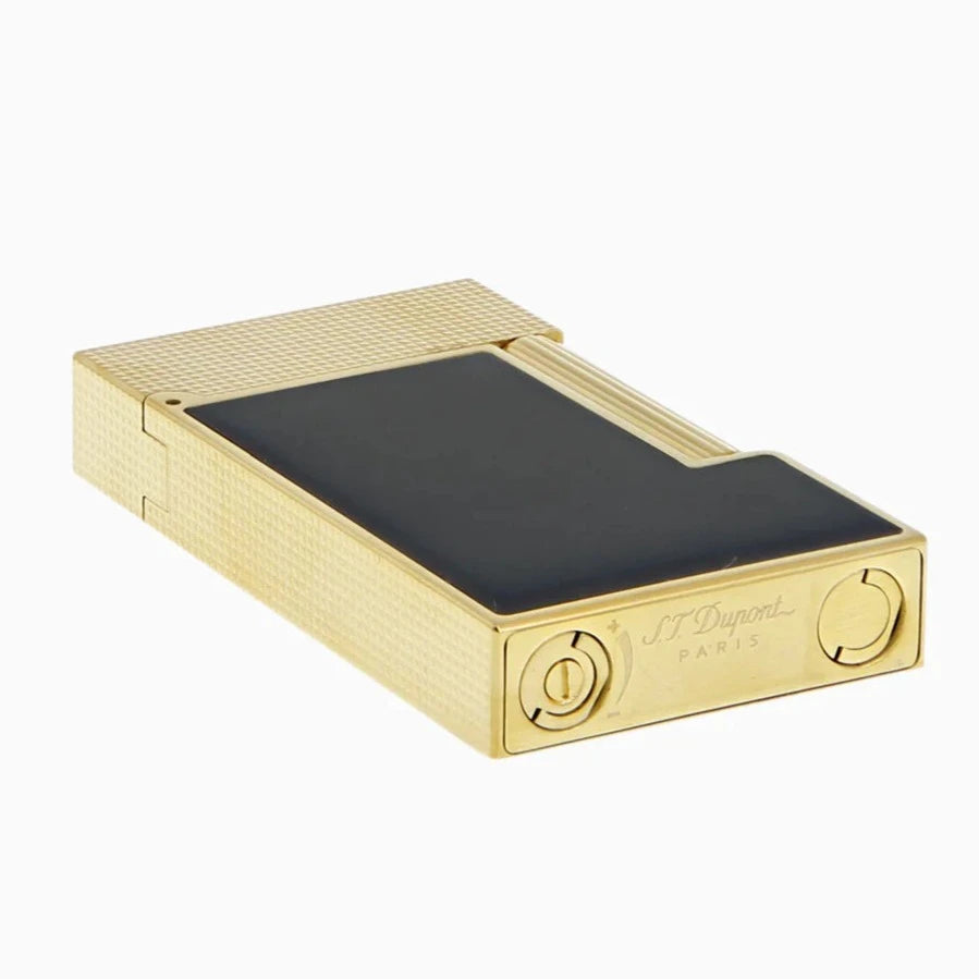 A S.T. Dupont Line 2 Gold Black Lacquer Lighter family with a gold and black cover.