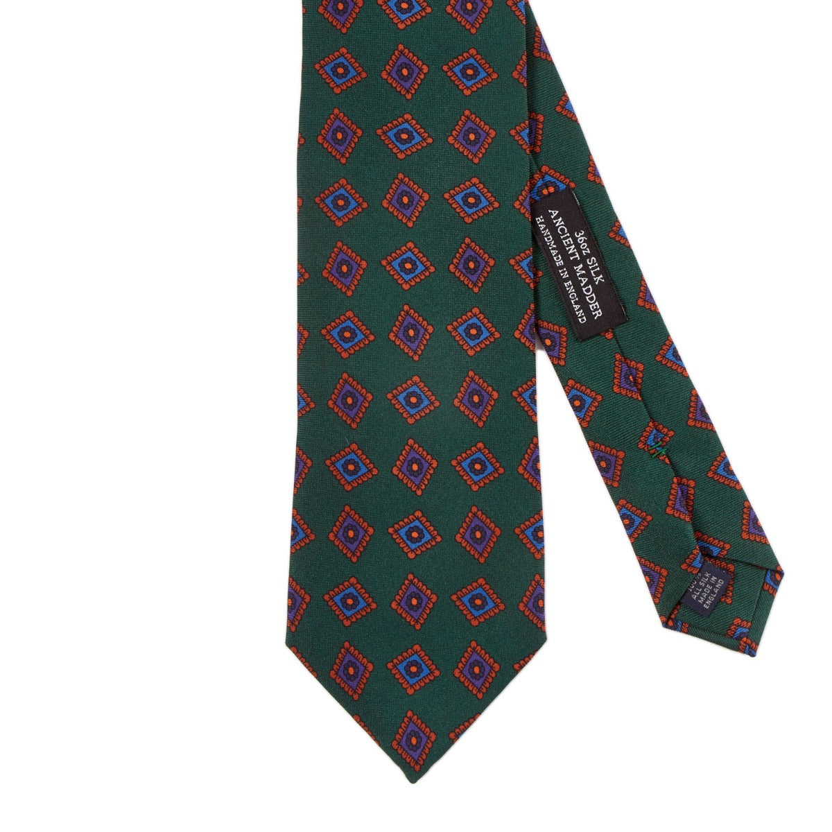 A Sovereign Grade Forrest Green Art Deco Ancient Madder Silk Tie by KirbyAllison.com with a green, red, and blue pattern of the highest quality.