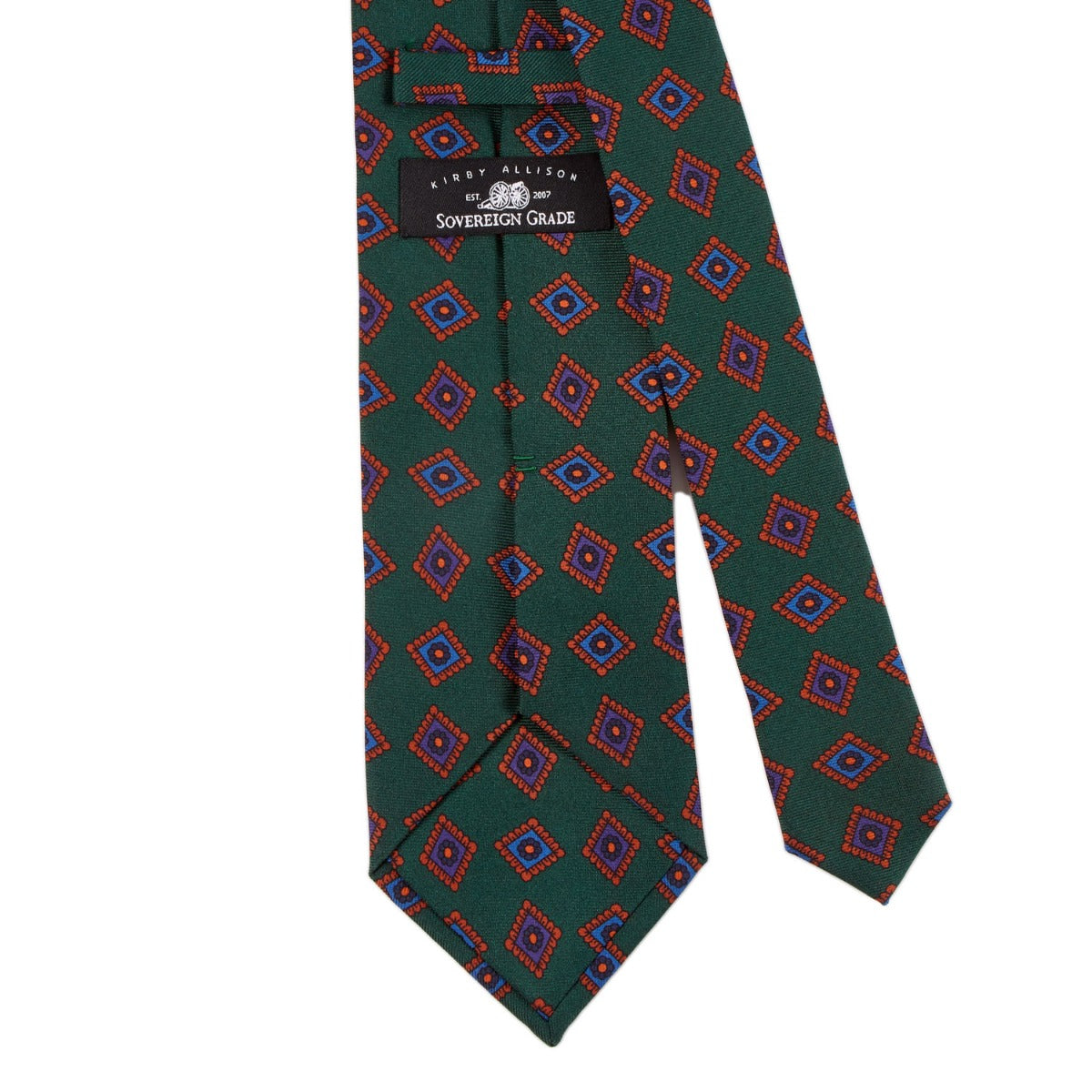 A Sovereign Grade Forrest Green Art Deco Ancient Madder Silk Tie with green, red, and blue diamonds, made in the United Kingdom, from KirbyAllison.com.