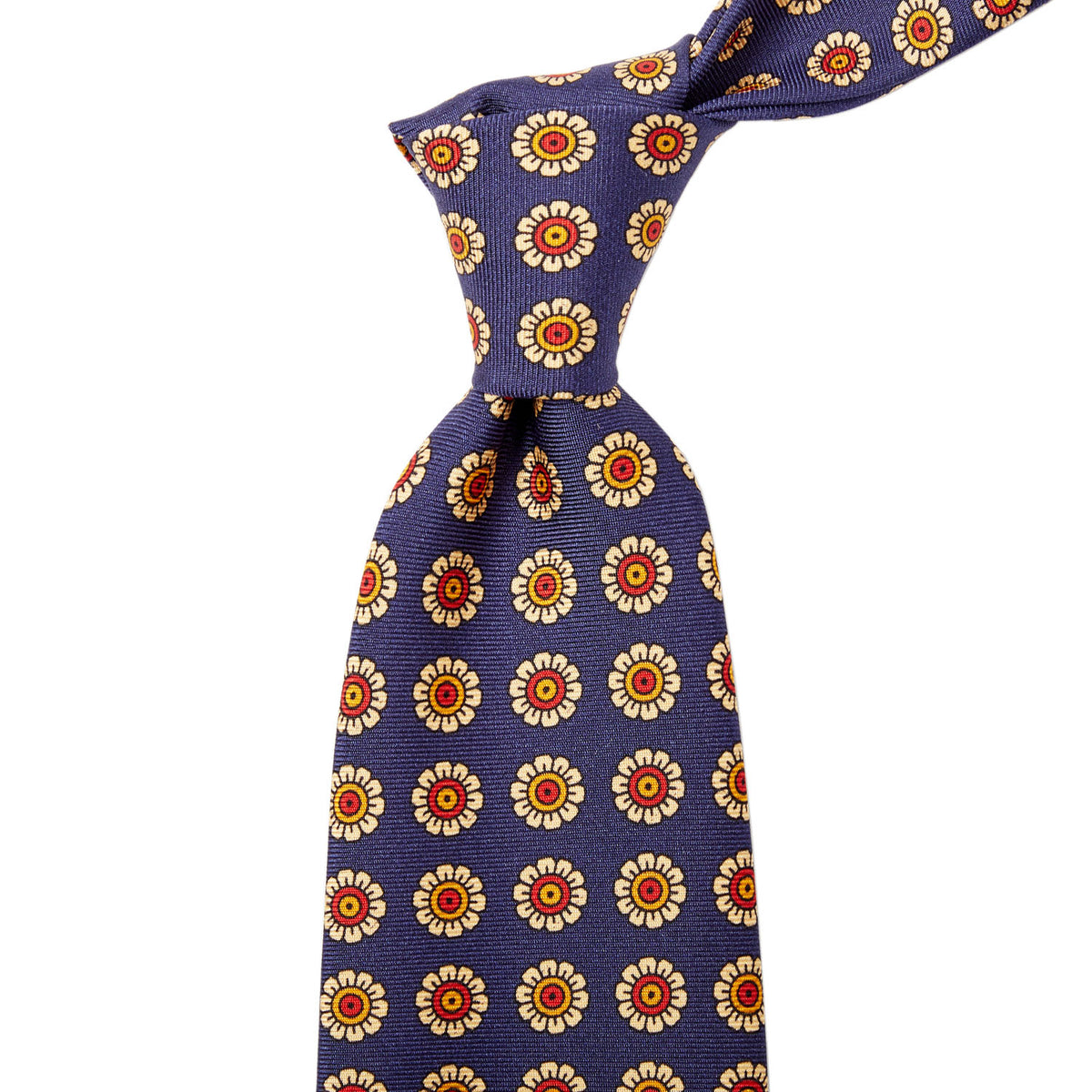 A KirbyAllison.com Sovereign Grade Navy Daisy Spring Madder Buff Tie (150x8.5 cm), with a flower pattern, made from 100% English silk, is of the highest quality and handmade.