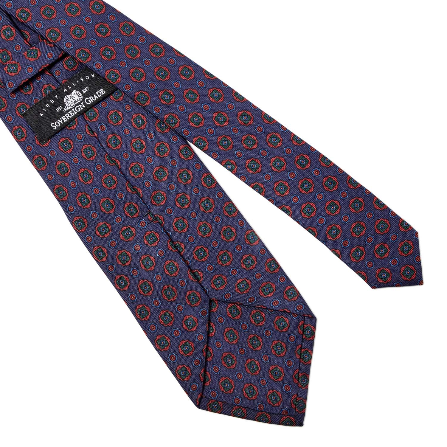 A highest quality KirbyAllison.com Sovereign Grade Dark Navy Geometric Floral Ancient Madder Tie (150x8.5 cm), made in the United Kingdom.