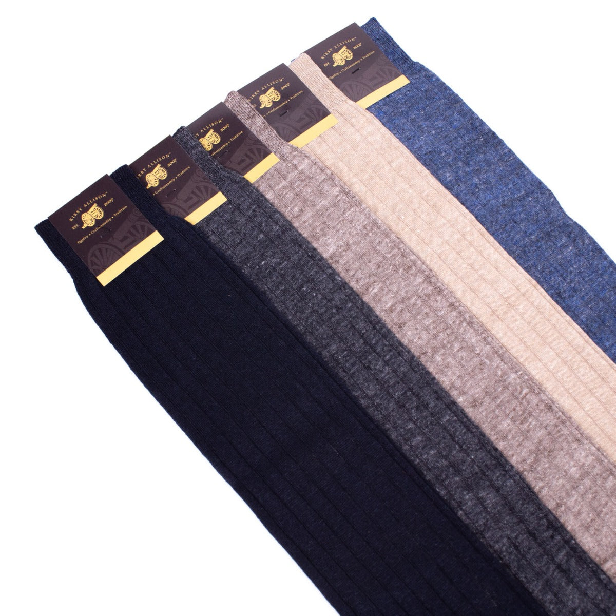 Four pairs of KirbyAllison.com's Sovereign Grade 100% Linen Dress Socks OTC in different colors.
