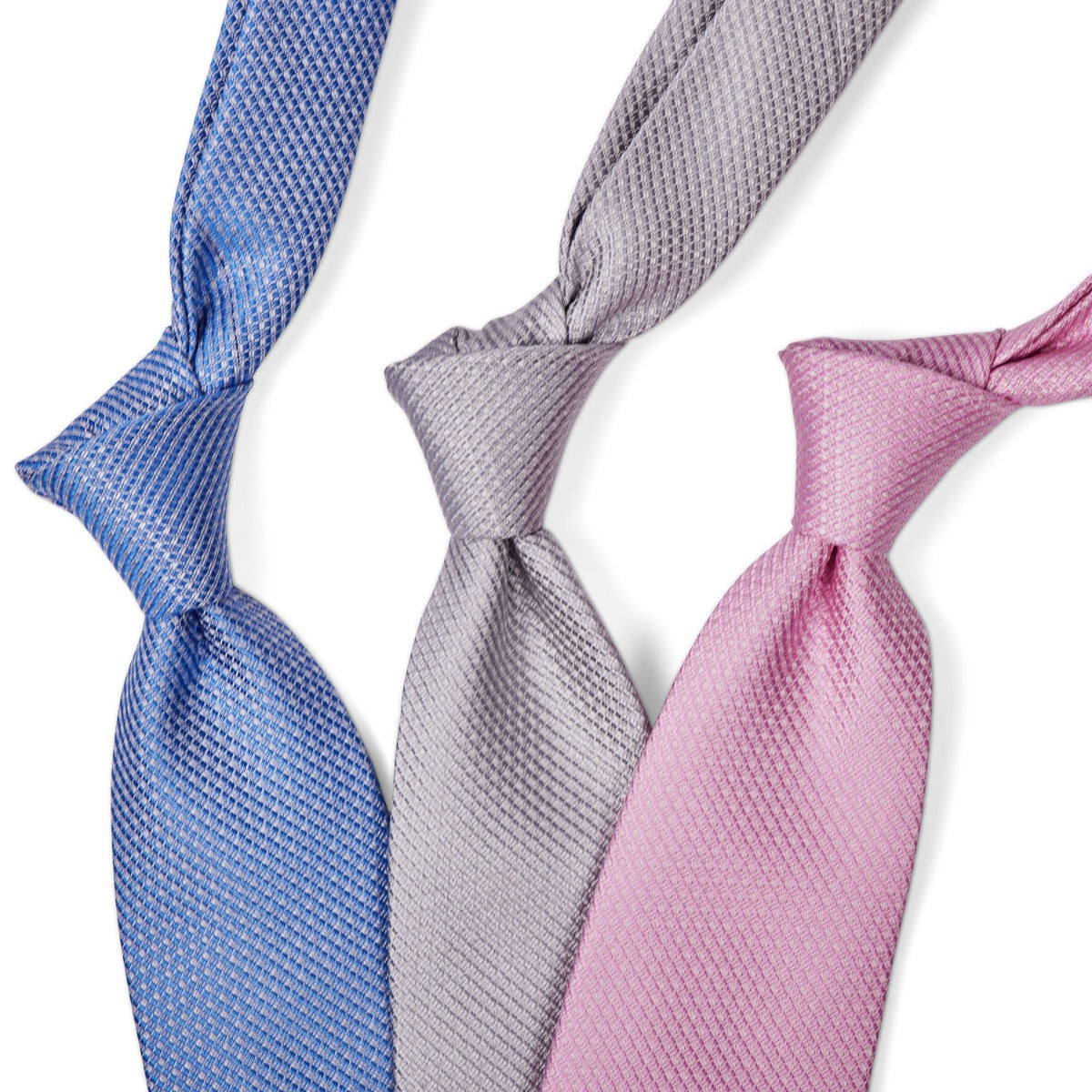 Three different colored Sovereign Grade Silver Jacquard Mock Grenadine ties on a white background from KirbyAllison.com.