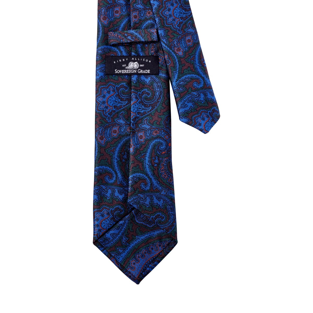 A Sovereign Grade Navy and Brown Paisley Ancient Madder Silk Tie from KirbyAllison.com on a white background.