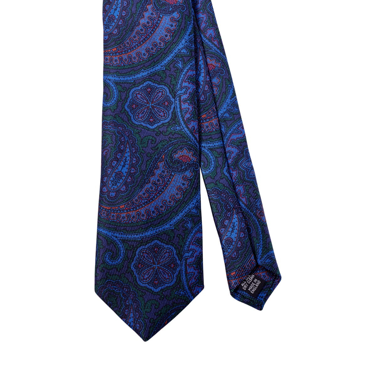 A handmade, Sovereign Grade Navy and Forest Paisley Ancient Madder Silk Tie by KirbyAllison.com on a white background.