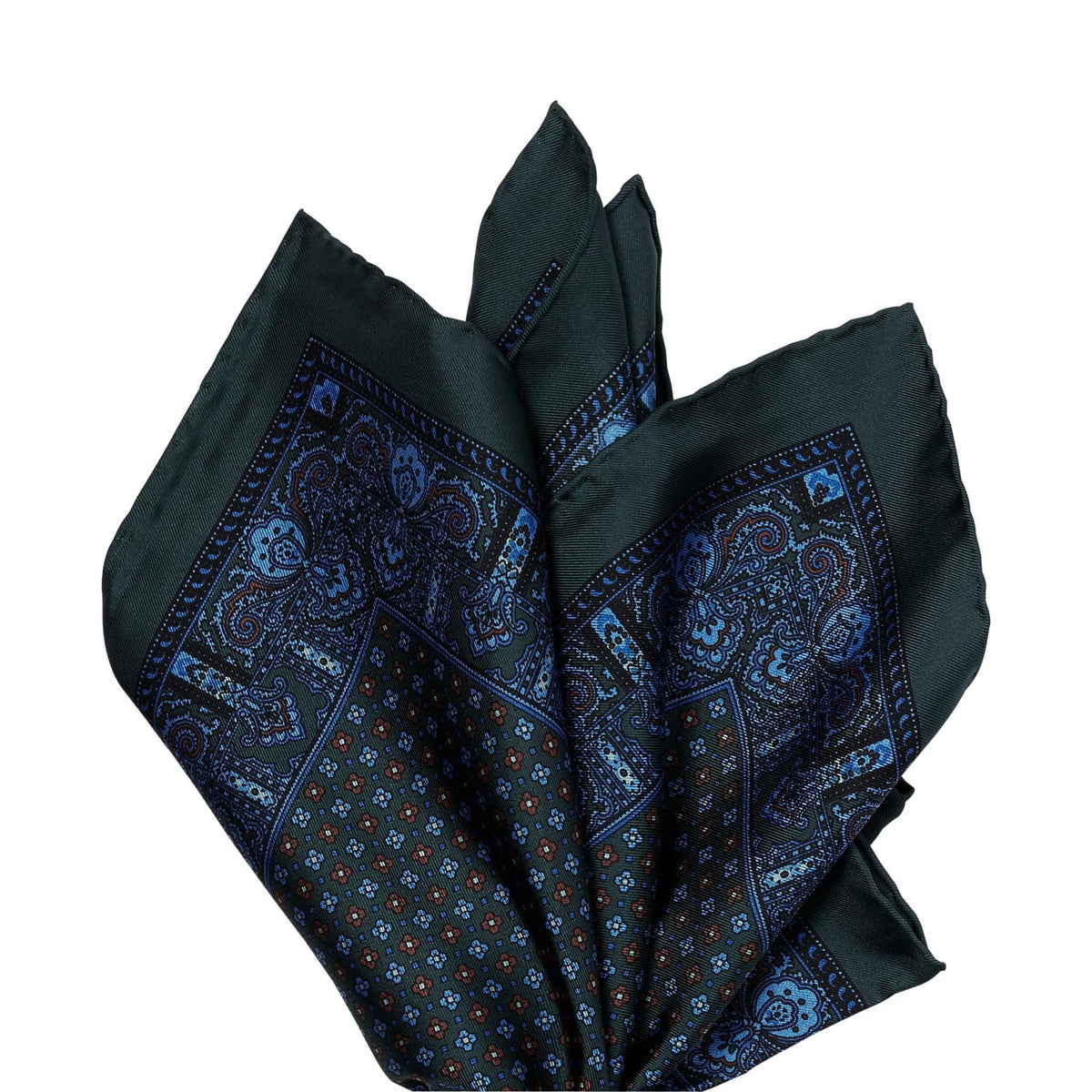 A Sovereign Grade 100% Silk Forest Repeating Floral pocket square with hand-rolled edges in a black and blue paisley pattern by KirbyAllison.com.