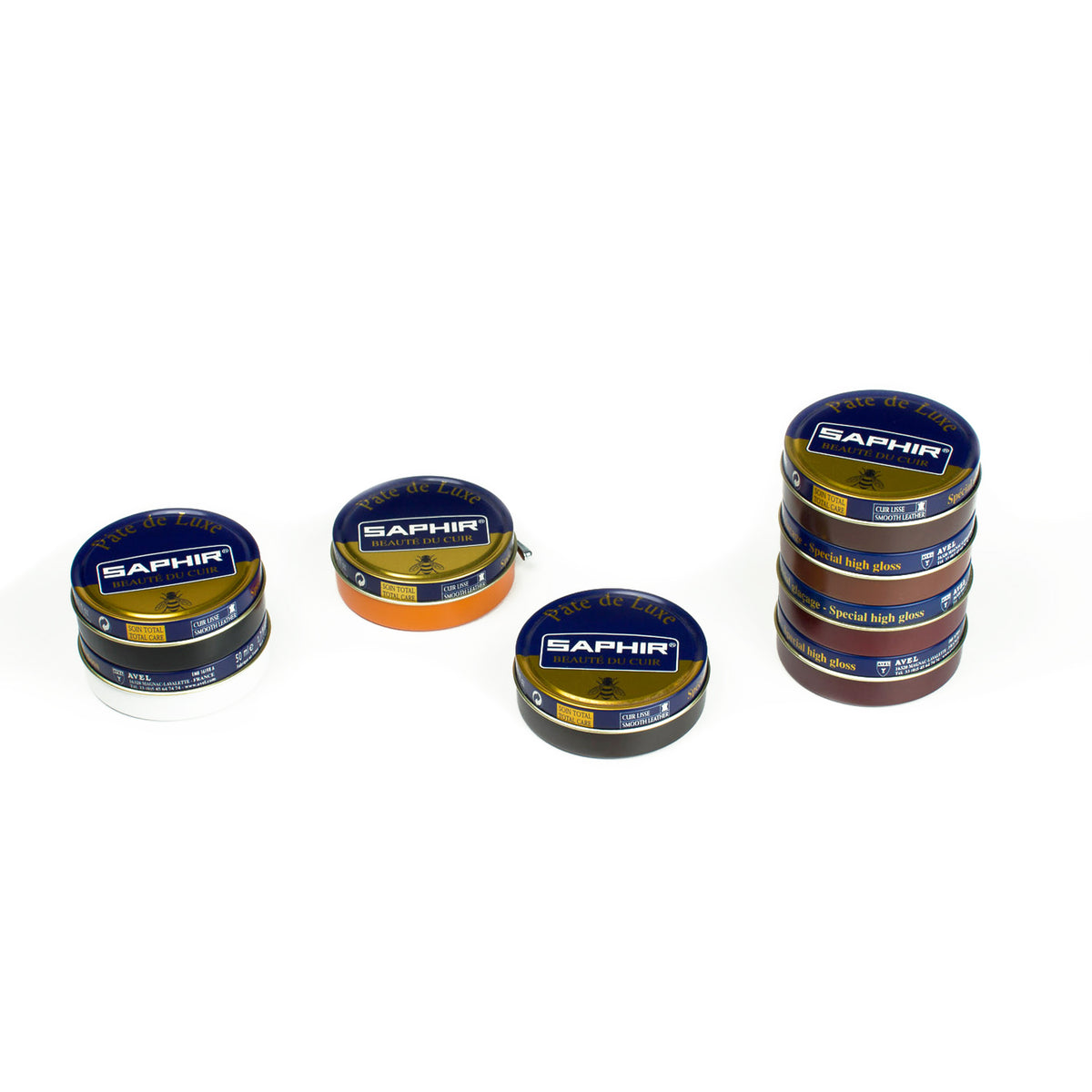 A group of tins with different colors of tape containing KirbyAllison.com Saphir Beaute de Cuir Wax Polish 50 ml, a nourishing polish made with beeswax.