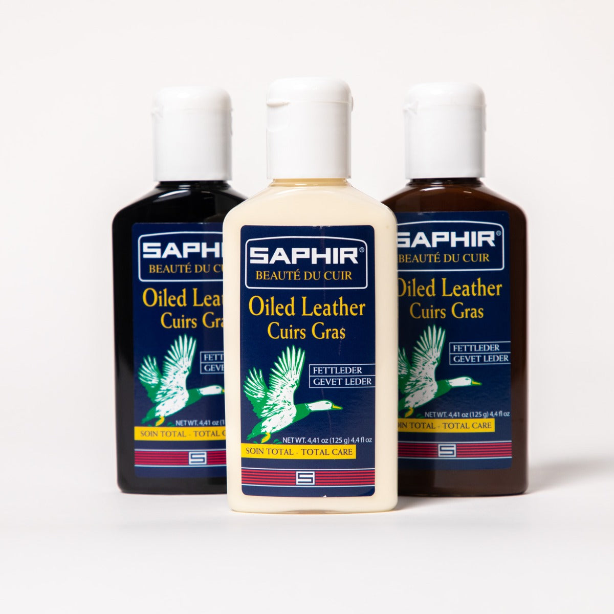 Three bottles of KirbyAllison.com's Saphir Chromexcel Oiled Leather Cream.