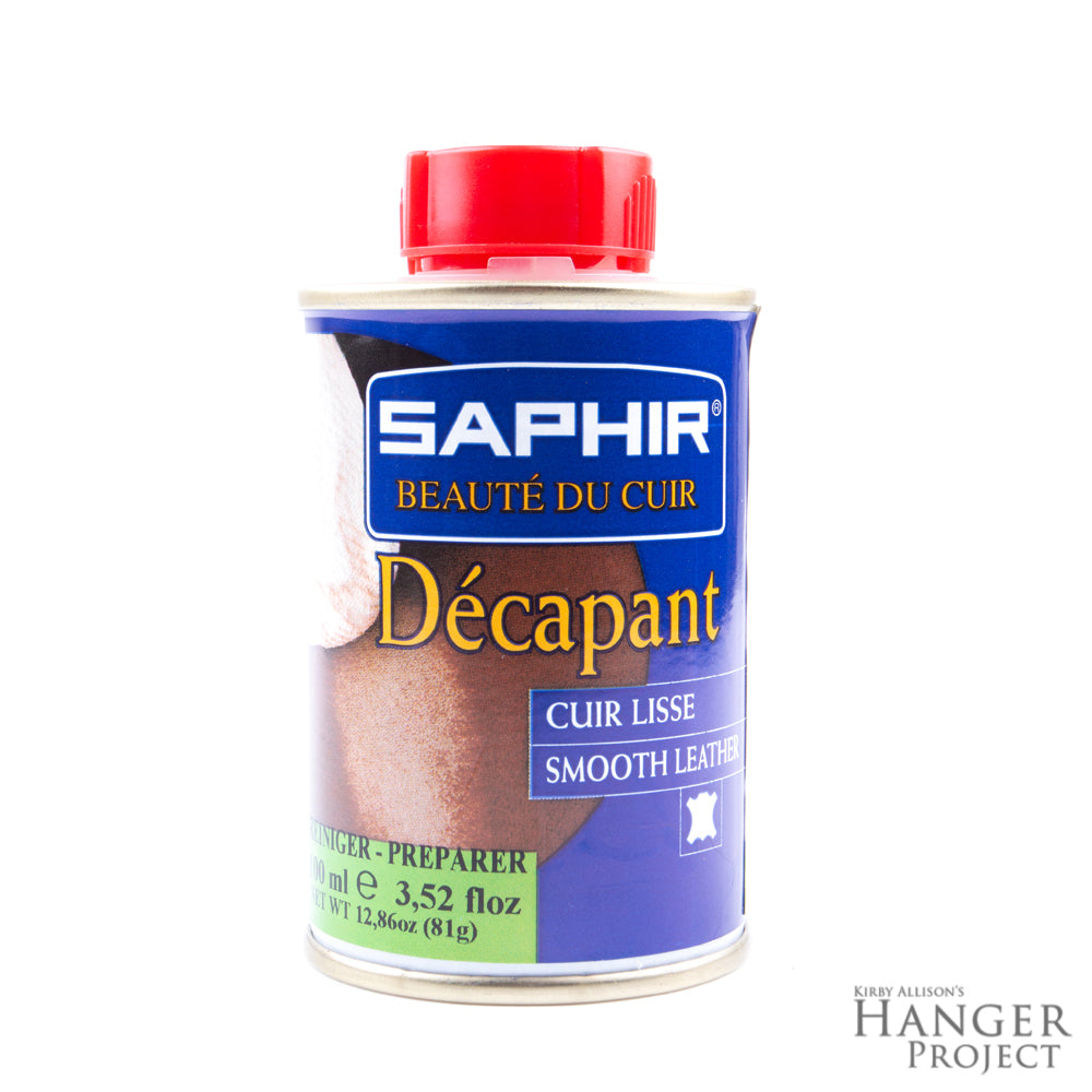 A bottle of Saphir Decapant Leather Stripper from KirbyAllison.com on a white background.