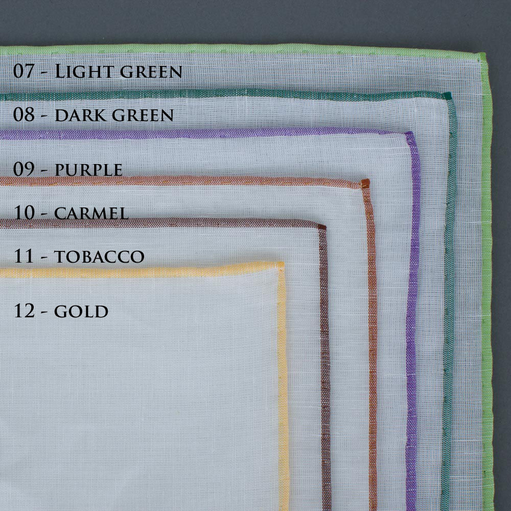 A set of Simonnot Godard Benjamin Linen Pocket Squares, also known as pocket squares, on a table.