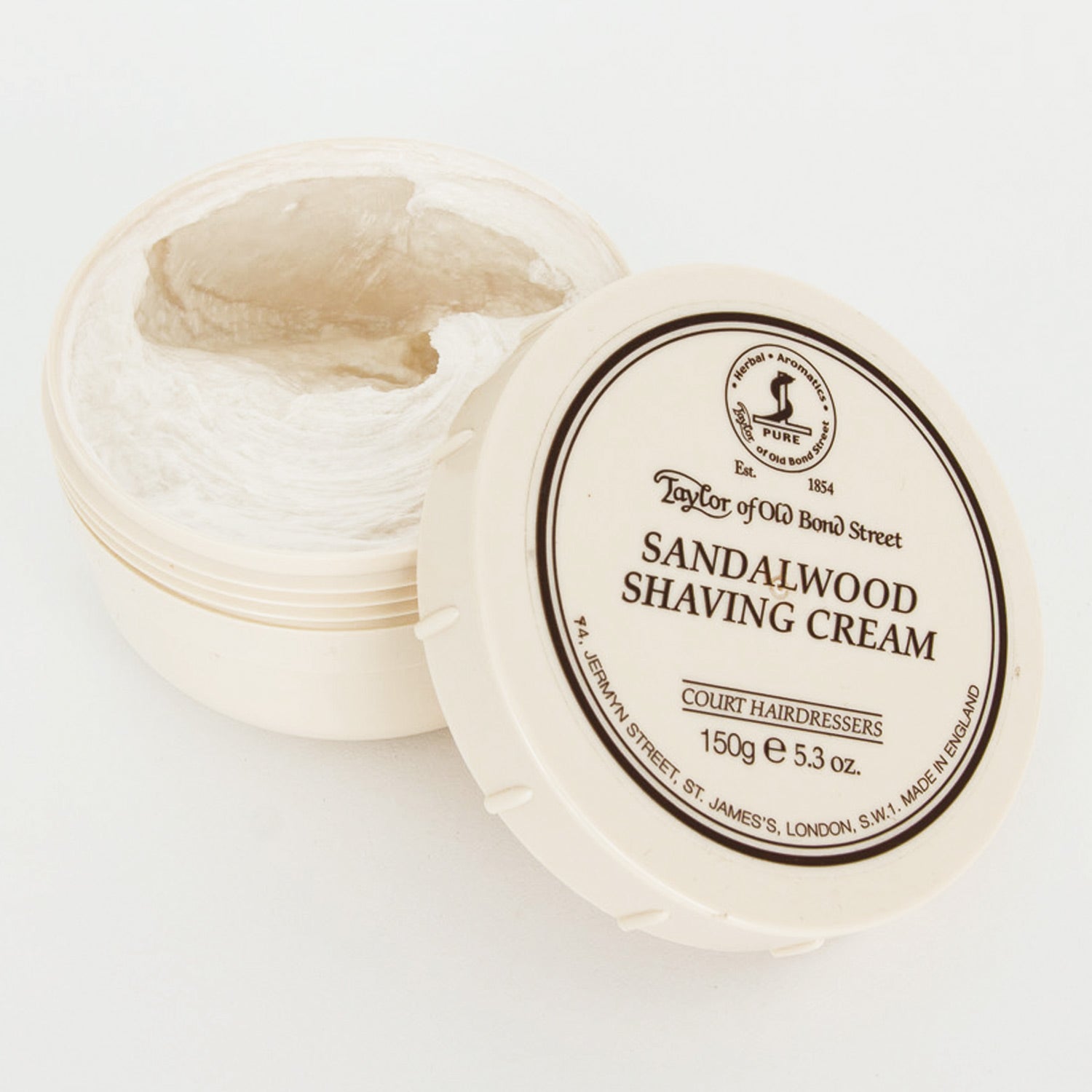 A container of Sandalwood Shaving Cream Bowl by Taylor of Old Bond Street on a white surface.