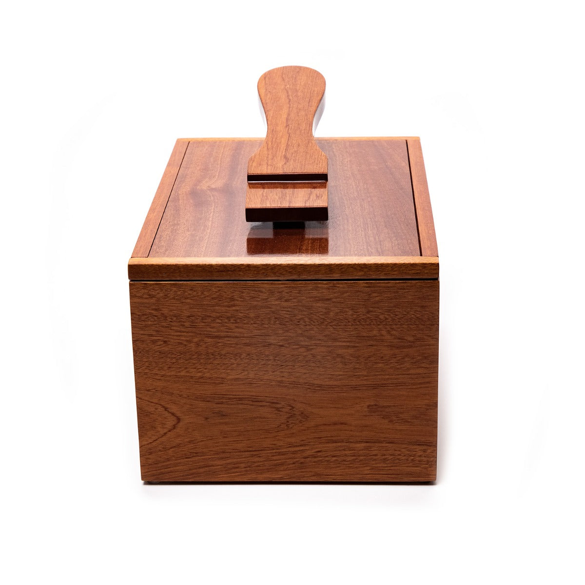 A handcrafted Deluxe Walnut Shoeshine Valet with a handle on it, made from solid walnut wood, by KirbyAllison.com.