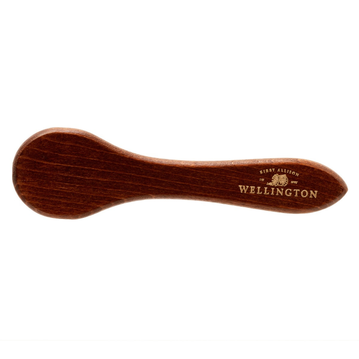 A wooden spoon engraved with the word "Williamston" and coated in KirbyAllison.com's Wellington Deluxe Shoe Polish Dauber.